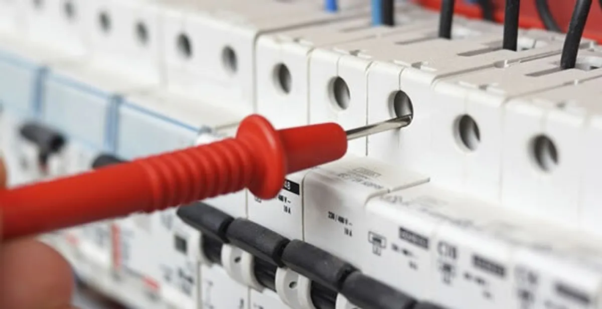 Electrical contractor testing circuit breakers during electrical repair in Millersville, PA