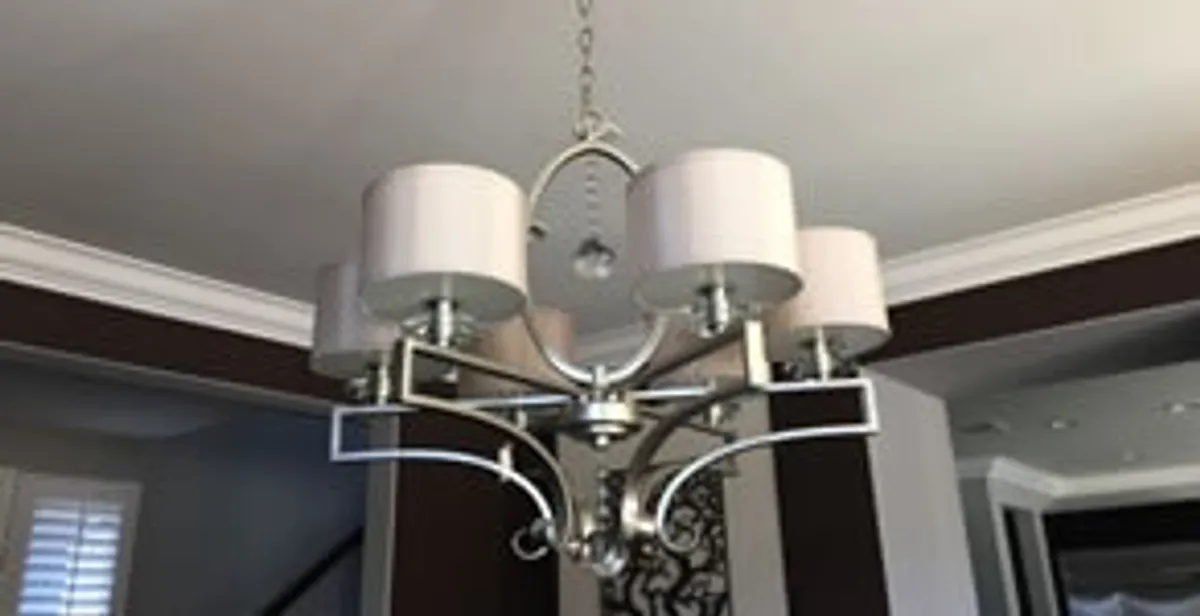 Modern chandelier installation with multiple light fixtures in Lancaster, PA